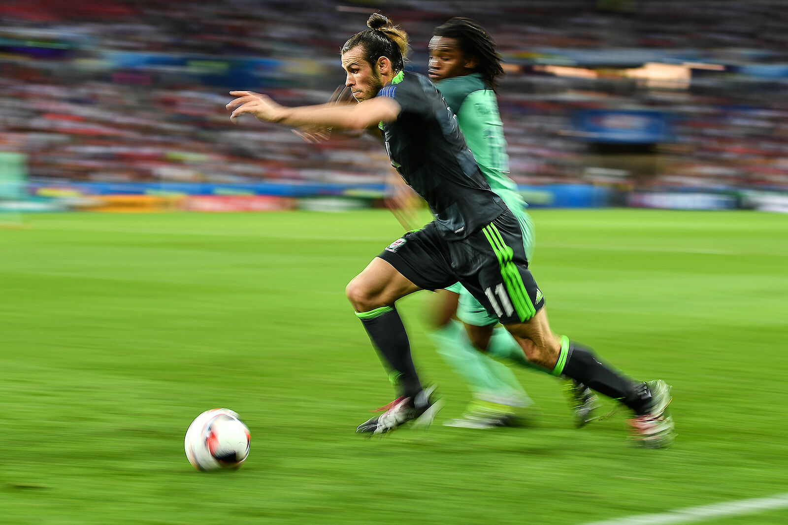 Portugal’s Renato Sanches, right, and Wales’ Gareth Bale during the UEFA Euro 2016 semifinal match between the Portuguese and Welsh national teams.