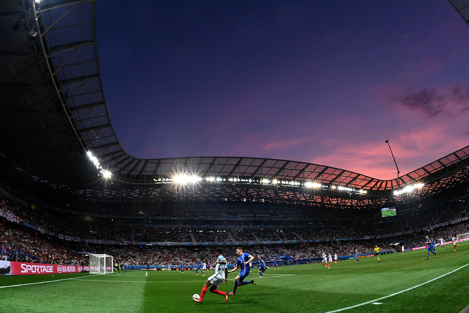 England’s Raheem Sterling, left, and Iceland’s Birkir Saevarsson during the 2016 UEFA European Championship 1/8 final between the national teams of England and Iceland